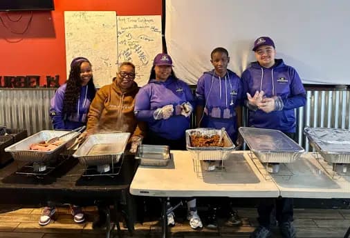 Mission comfort serving food for community outreach.